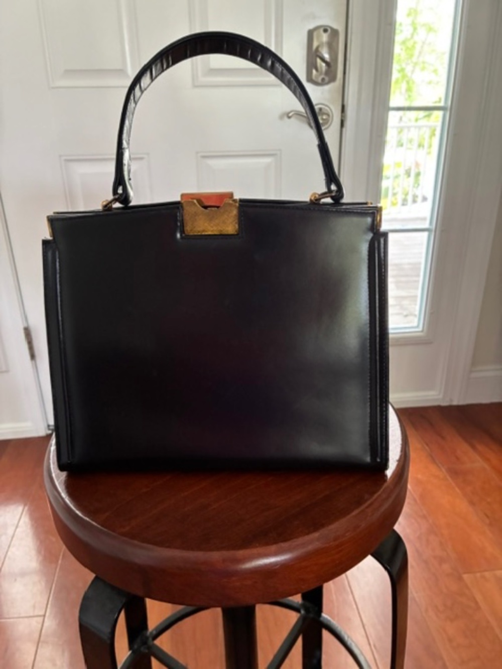 DOFAN BLACK LEATHER HANDBAG. MADE IN FRANCE.